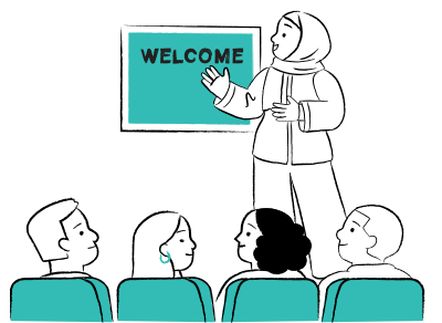 Illustration: A teacher giving an introduction at the front of a class